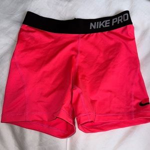 neon pink nike pros